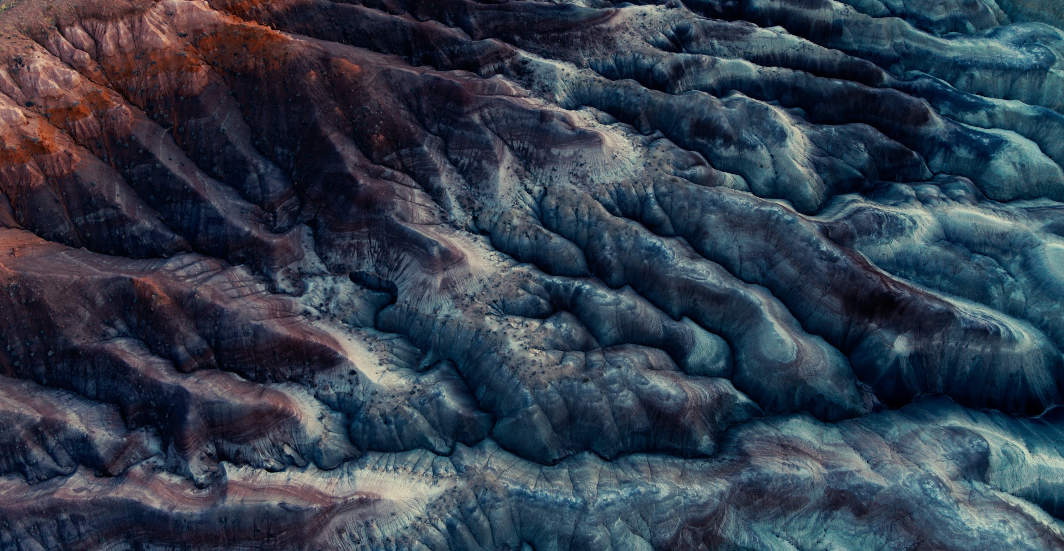 Aerial view of mineral-rich geological terrain